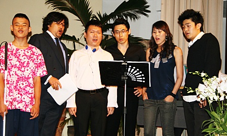 The singing superstars joined the blind students in a rendition of Amazing Grace.